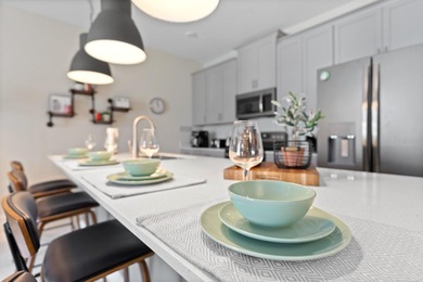 INCOME READY INVESTMENT OPPORTUNITY!! 4 bedroom/3 bath POOL home on ChampionsGate Golf Resort in Florida - for sale on GolfHomes.com, golf home, golf lot