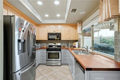 Nestled in the desirable Meadow Hills Community of North Azusa on Azusa Greens Country Club in California - for sale on GolfHomes.com, golf home, golf lot