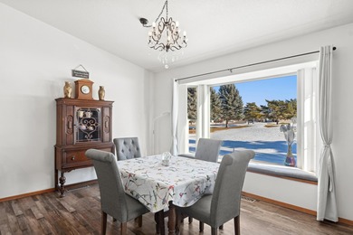 Wake up to sweeping golf course and mountain views in this on Village Greens Golf Club in Montana - for sale on GolfHomes.com, golf home, golf lot