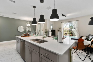 INCOME READY INVESTMENT OPPORTUNITY!! 4 bedroom/3 bath POOL home on ChampionsGate Golf Resort in Florida - for sale on GolfHomes.com, golf home, golf lot