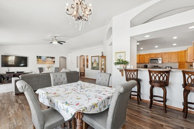 Wake up to sweeping golf course and mountain views in this on Village Greens Golf Club in Montana - for sale on GolfHomes.com, golf home, golf lot