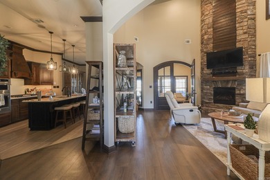 Stunning updated executive home with sunroom and screened porch on Sage Meadows Golf Course in Arkansas - for sale on GolfHomes.com, golf home, golf lot