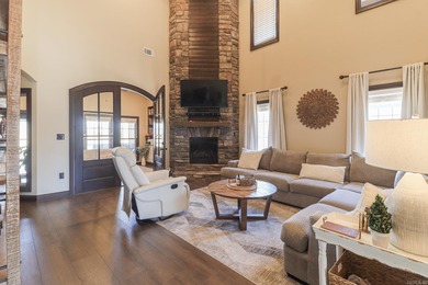 Stunning updated executive home with sunroom and screened porch on Sage Meadows Golf Course in Arkansas - for sale on GolfHomes.com, golf home, golf lot