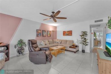 Enjoy South Florida living with this 2Bed/2Bath second floor on Hillsboro Pines Golf in Florida - for sale on GolfHomes.com, golf home, golf lot