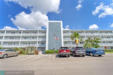 Enjoy South Florida living with this 2Bed/2Bath second floor on Hillsboro Pines Golf in Florida - for sale on GolfHomes.com, golf home, golf lot