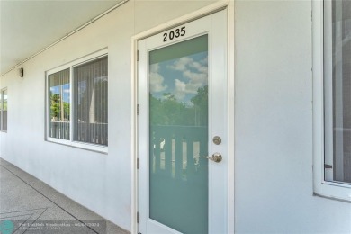 Enjoy South Florida living with this 2Bed/2Bath second floor on Hillsboro Pines Golf in Florida - for sale on GolfHomes.com, golf home, golf lot