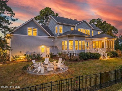 Situated within an exceptionally private cul-de-sac and embraced on Members Club At St. James Plantation in North Carolina - for sale on GolfHomes.com, golf home, golf lot