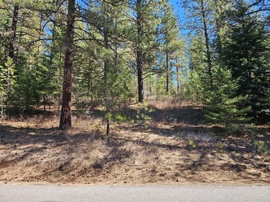 Beautifully wooded, nearly 3/4 acre lot offered for sale in the on Meadowcreek Golf Resort in Idaho - for sale on GolfHomes.com, golf home, golf lot