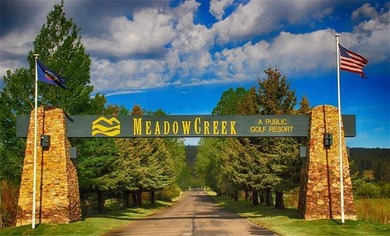 Beautifully wooded, nearly 3/4 acre lot offered for sale in the on Meadowcreek Golf Resort in Idaho - for sale on GolfHomes.com, golf home, golf lot