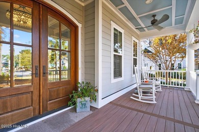 Situated within an exceptionally private cul-de-sac and embraced on Members Club At St. James Plantation in North Carolina - for sale on GolfHomes.com, golf home, golf lot