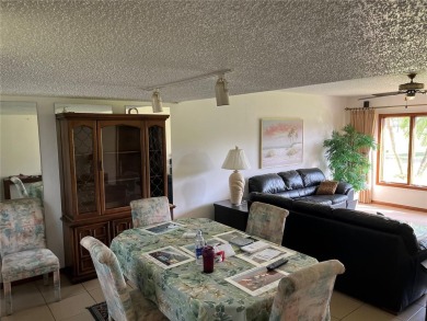 OWNER FINANCING 2-bedroom, 2-bathroom, Den first floor end unit on Bardmoor Golf and Tennis Club in Florida - for sale on GolfHomes.com, golf home, golf lot