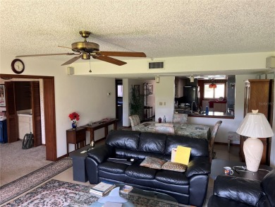 OWNER FINANCING 2-bedroom, 2-bathroom, Den first floor end unit on Bardmoor Golf and Tennis Club in Florida - for sale on GolfHomes.com, golf home, golf lot