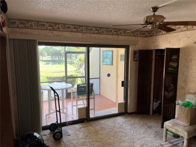 OWNER FINANCING 2-bedroom, 2-bathroom, Den first floor end unit on Bardmoor Golf and Tennis Club in Florida - for sale on GolfHomes.com, golf home, golf lot