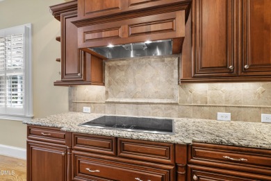 This French Provincial, Ammons' Model Home in Heritage sits on on Heritage Golf Club in North Carolina - for sale on GolfHomes.com, golf home, golf lot