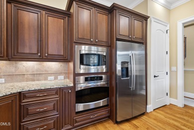 This French Provincial, Ammons' Model Home in Heritage sits on on Heritage Golf Club in North Carolina - for sale on GolfHomes.com, golf home, golf lot