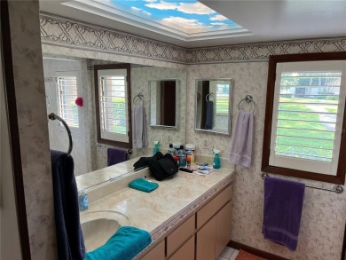 OWNER FINANCING 2-bedroom, 2-bathroom, Den first floor end unit on Bardmoor Golf and Tennis Club in Florida - for sale on GolfHomes.com, golf home, golf lot