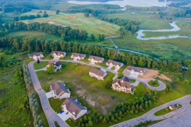 Welcome home to low maintenance condo living just steps away on Angels Crossing Golf Club in Michigan - for sale on GolfHomes.com, golf home, golf lot