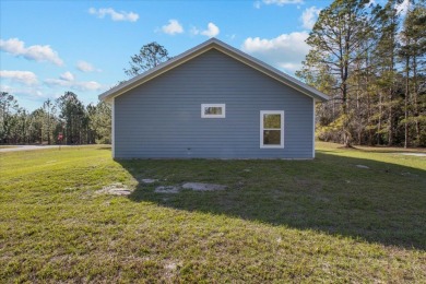 Gorgeous CUSTOM LIVEWELL site built home located in the much on Chiefland Golf and Country Club in Florida - for sale on GolfHomes.com, golf home, golf lot