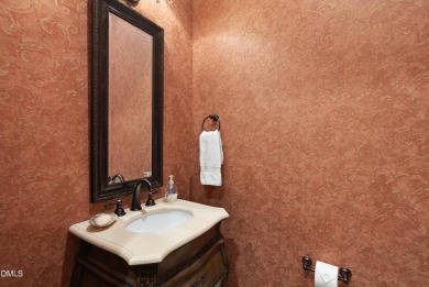 This French Provincial, Ammons' Model Home in Heritage sits on on Heritage Golf Club in North Carolina - for sale on GolfHomes.com, golf home, golf lot