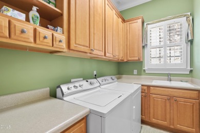 This French Provincial, Ammons' Model Home in Heritage sits on on Heritage Golf Club in North Carolina - for sale on GolfHomes.com, golf home, golf lot
