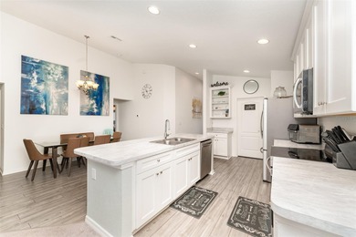 From the moment you pull into the extended driveway, you can on Sun n Lake Golf and Country Club in Florida - for sale on GolfHomes.com, golf home, golf lot