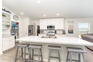 From the moment you pull into the extended driveway, you can on Sun n Lake Golf and Country Club in Florida - for sale on GolfHomes.com, golf home, golf lot