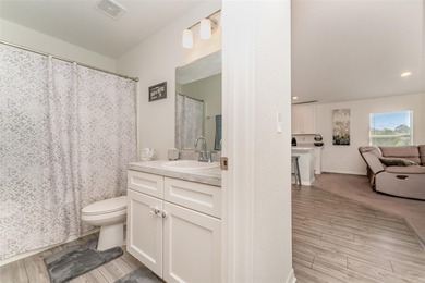 From the moment you pull into the extended driveway, you can on Sun n Lake Golf and Country Club in Florida - for sale on GolfHomes.com, golf home, golf lot