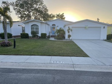 This nice Triple wide home has 3-bedroom and 2-bathrooms with on Del Tura Golf and Country Club in Florida - for sale on GolfHomes.com, golf home, golf lot