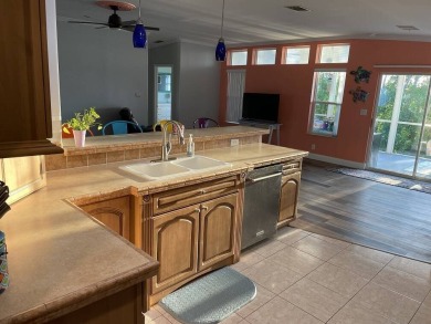 This nice Triple wide home has 3-bedroom and 2-bathrooms with on Del Tura Golf and Country Club in Florida - for sale on GolfHomes.com, golf home, golf lot