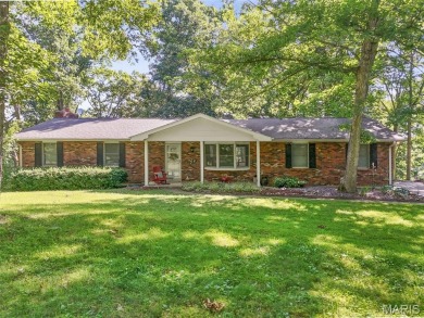 Discover the perfect blend of privacy, nature, and convenience on Incline Village Golf Course in Missouri - for sale on GolfHomes.com, golf home, golf lot