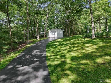Discover the perfect blend of privacy, nature, and convenience on Incline Village Golf Course in Missouri - for sale on GolfHomes.com, golf home, golf lot
