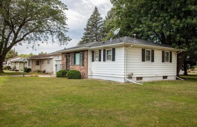 On an outstanding corner lot, just shy of a quarter acre, in a on Irv Warren Memorial Golf Course in Iowa - for sale on GolfHomes.com, golf home, golf lot