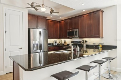 Stunning Lakefront Luxury Condo at Waterfront at Main Street on Legacy Golf Club in Florida - for sale on GolfHomes.com, golf home, golf lot
