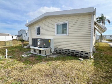Discerning buyers who want value! Don't miss this 2 bed/2 bath on Mangrove Bay Golf Course in Florida - for sale on GolfHomes.com, golf home, golf lot