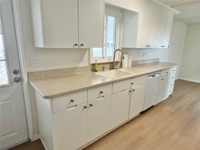 Discerning buyers who want value! Don't miss this 2 bed/2 bath on Mangrove Bay Golf Course in Florida - for sale on GolfHomes.com, golf home, golf lot