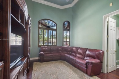 This exquisite home embraces a one-of-a-kind expansive  1/2 on Weston Hills Country Club in Florida - for sale on GolfHomes.com, golf home, golf lot