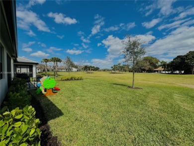 JUST REDUCED !! Location..Location..Location! Country Club on Woodmont Country Club in Florida - for sale on GolfHomes.com, golf home, golf lot
