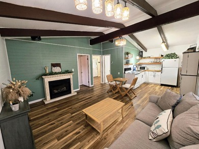 Escape to your serene retreat in the woods. Nestled above Lake on Hide-A-Way Hills Golf Club in Ohio - for sale on GolfHomes.com, golf home, golf lot