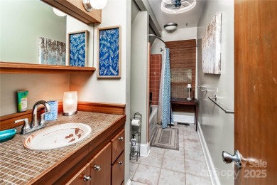 Designed in 1963 by renowned architect Fritz Schmidt, this on Quail Hollow Club in North Carolina - for sale on GolfHomes.com, golf home, golf lot