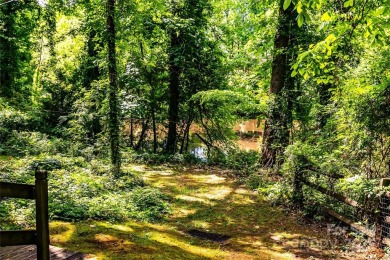 Designed in 1963 by renowned architect Fritz Schmidt, this on Quail Hollow Club in North Carolina - for sale on GolfHomes.com, golf home, golf lot