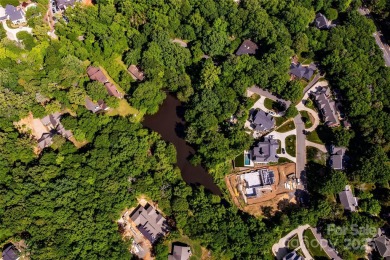Designed in 1963 by renowned architect Fritz Schmidt, this on Quail Hollow Club in North Carolina - for sale on GolfHomes.com, golf home, golf lot