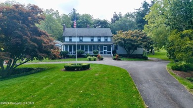 Stunning 6-bed, 5-bath farmhouse beautifully situated on almost on Valley Country Club in Pennsylvania - for sale on GolfHomes.com, golf home, golf lot