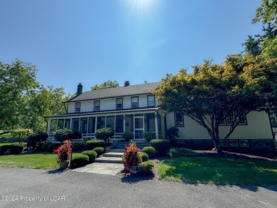 Stunning 6-bed, 5-bath farmhouse beautifully situated on almost on Valley Country Club in Pennsylvania - for sale on GolfHomes.com, golf home, golf lot