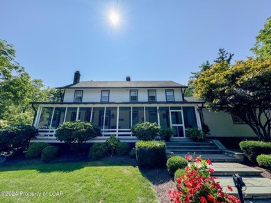 Stunning 6-bed, 5-bath farmhouse beautifully situated on almost on Valley Country Club in Pennsylvania - for sale on GolfHomes.com, golf home, golf lot