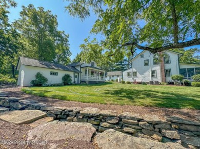 Stunning 6-bed, 5-bath farmhouse beautifully situated on almost on Valley Country Club in Pennsylvania - for sale on GolfHomes.com, golf home, golf lot