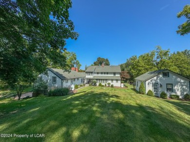 Stunning 6-bed, 5-bath farmhouse beautifully situated on almost on Valley Country Club in Pennsylvania - for sale on GolfHomes.com, golf home, golf lot