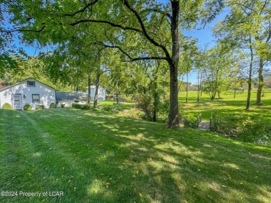 Stunning 6-bed, 5-bath farmhouse beautifully situated on almost on Valley Country Club in Pennsylvania - for sale on GolfHomes.com, golf home, golf lot