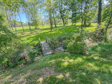 Stunning 6-bed, 5-bath farmhouse beautifully situated on almost on Valley Country Club in Pennsylvania - for sale on GolfHomes.com, golf home, golf lot