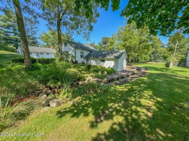 Stunning 6-bed, 5-bath farmhouse beautifully situated on almost on Valley Country Club in Pennsylvania - for sale on GolfHomes.com, golf home, golf lot