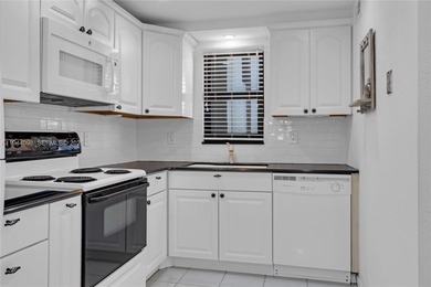 Excellent opportunity to live in the beautiful Palms Tower II on Deer Creek Golf Club in Florida - for sale on GolfHomes.com, golf home, golf lot